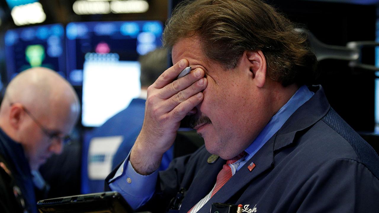 Stocks slide sharply, erasing gains made over last month