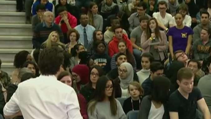 Trudeau corrects woman for using 'mankind' at town hall