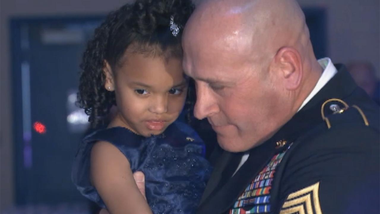 Fellow serviceman accompanies fallen vet's daughter to dance