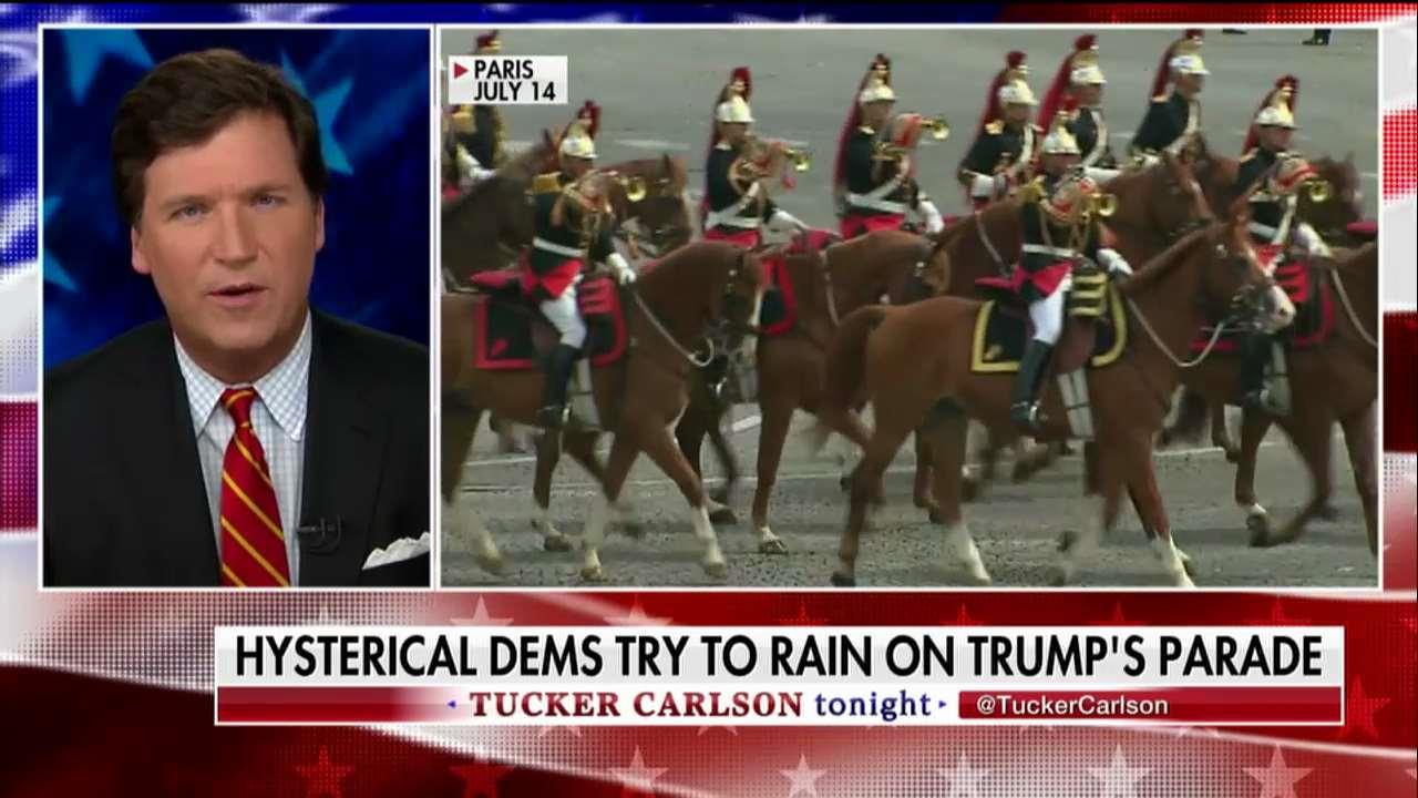 Tucker Carlson on left going into hysterics about military parade.