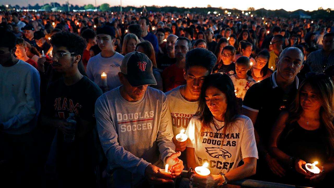 Hundreds attend vigil for victims of deadly school shooting