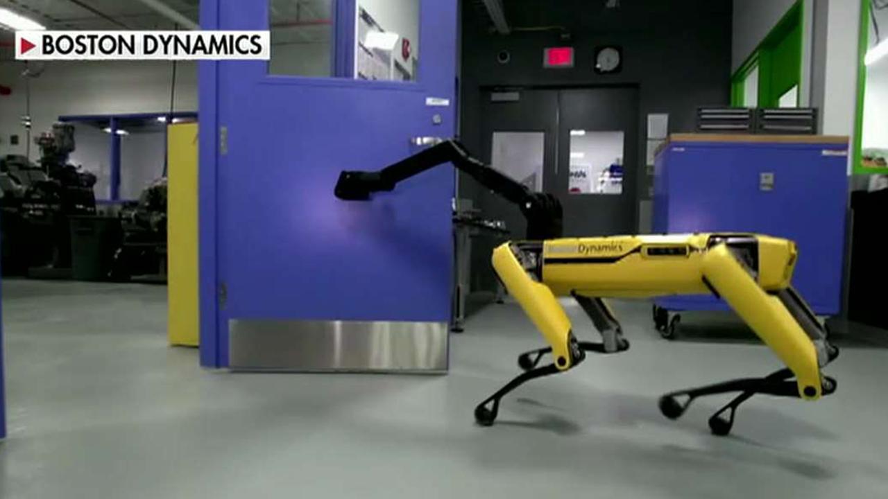 Robots are working together to open doors