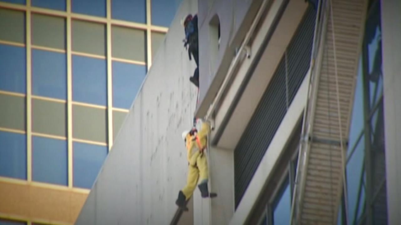 Scaffolding accident leaves workers dangling