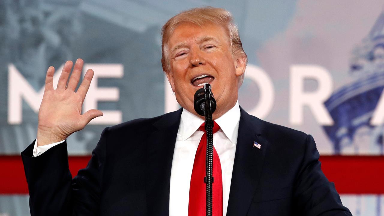 Trump wows CPAC crowd, jokes about his famous hairdo