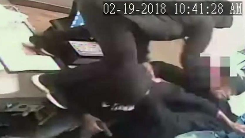 Pizza Hut clerk takes on three armed robbers