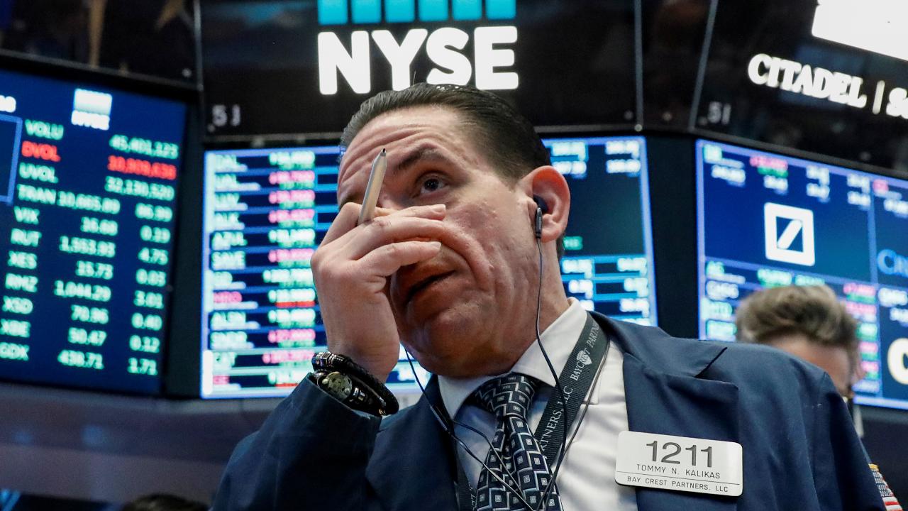 Stocks sink as Trump talks about tariffs