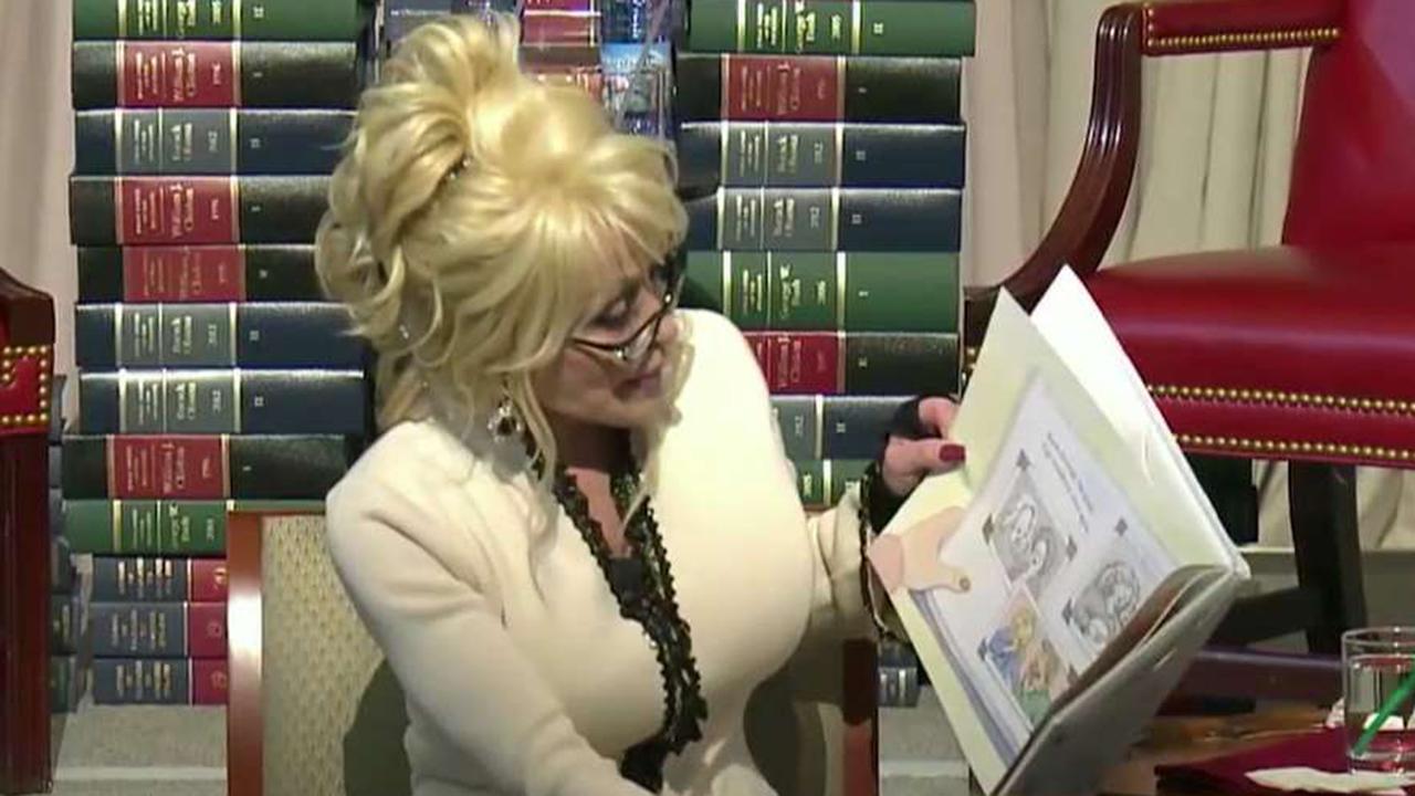 Dolly Parton celebrates her love of books by giving back