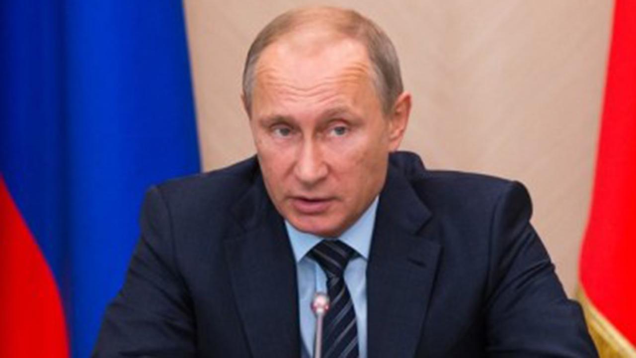 Putin says he won't extradite Russians indicted by Mueller