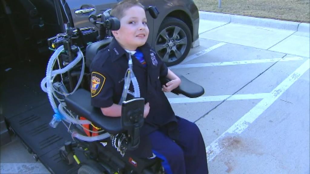 Texas boy with rare disorder gets wish granted and becomes a cop