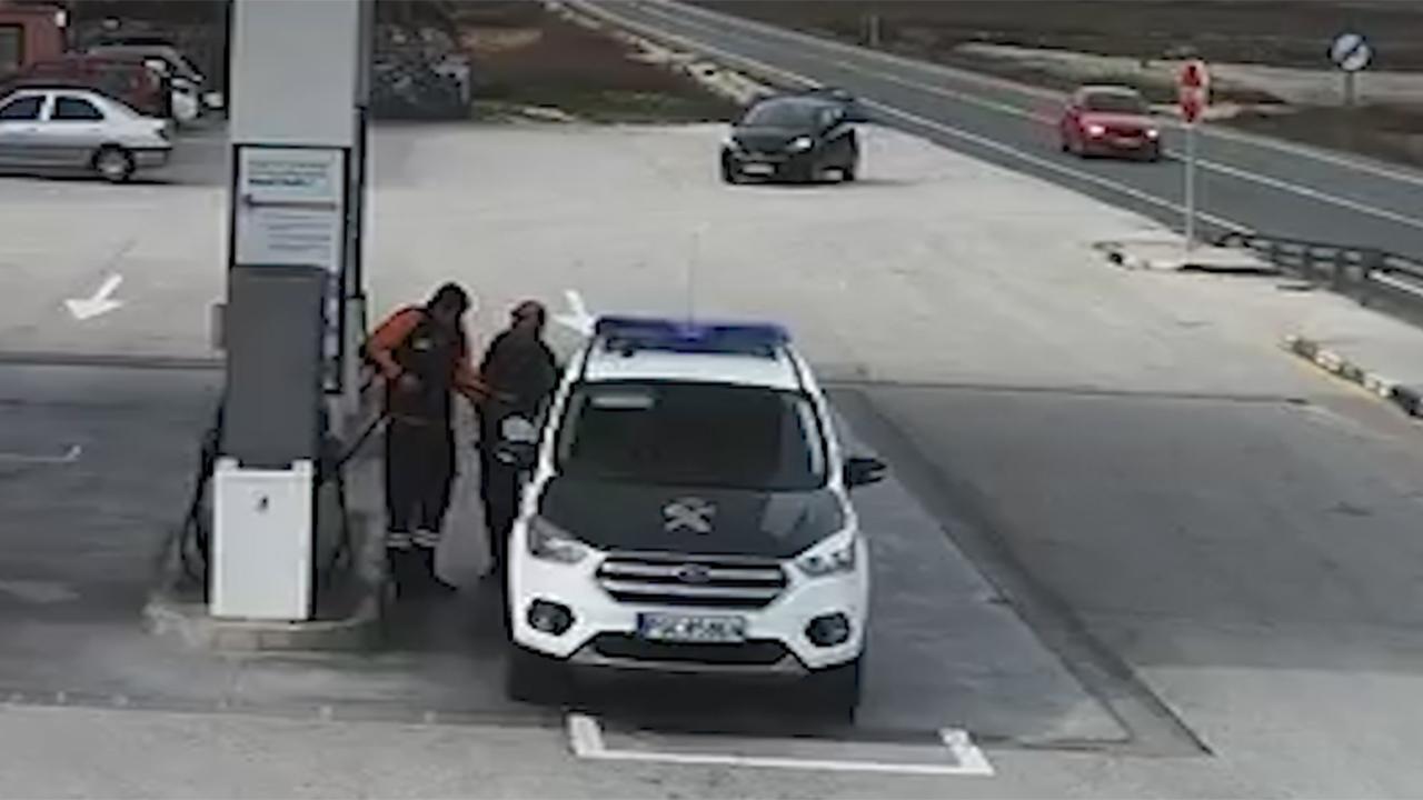Look out! Out-of-control car nearly kills cop at gas station