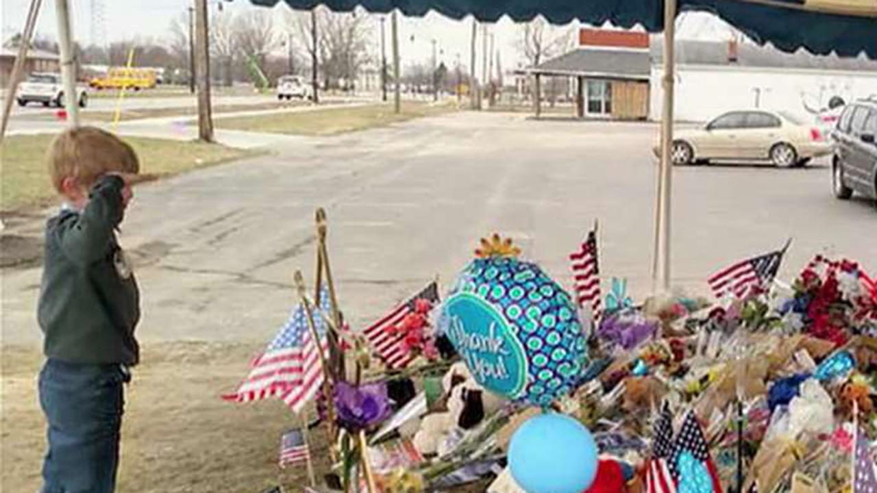 6-year-old salutes fallen deputy's memorial