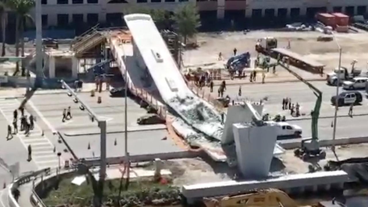 Raw video of aftermath of FIU bridge collapse