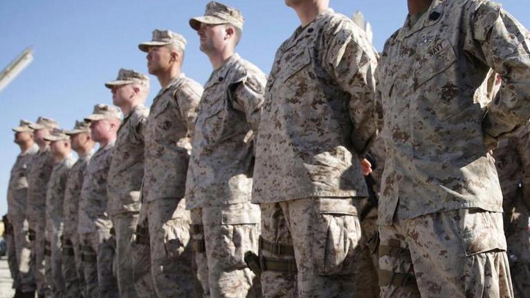 Trump moves to ban most transgender troops from serving