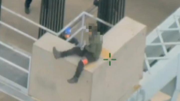 Shocking video: New York police save suicidal man on top of bridge 