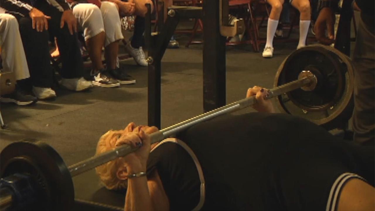 97-year-old flexes muscles at namesake powerlifting event