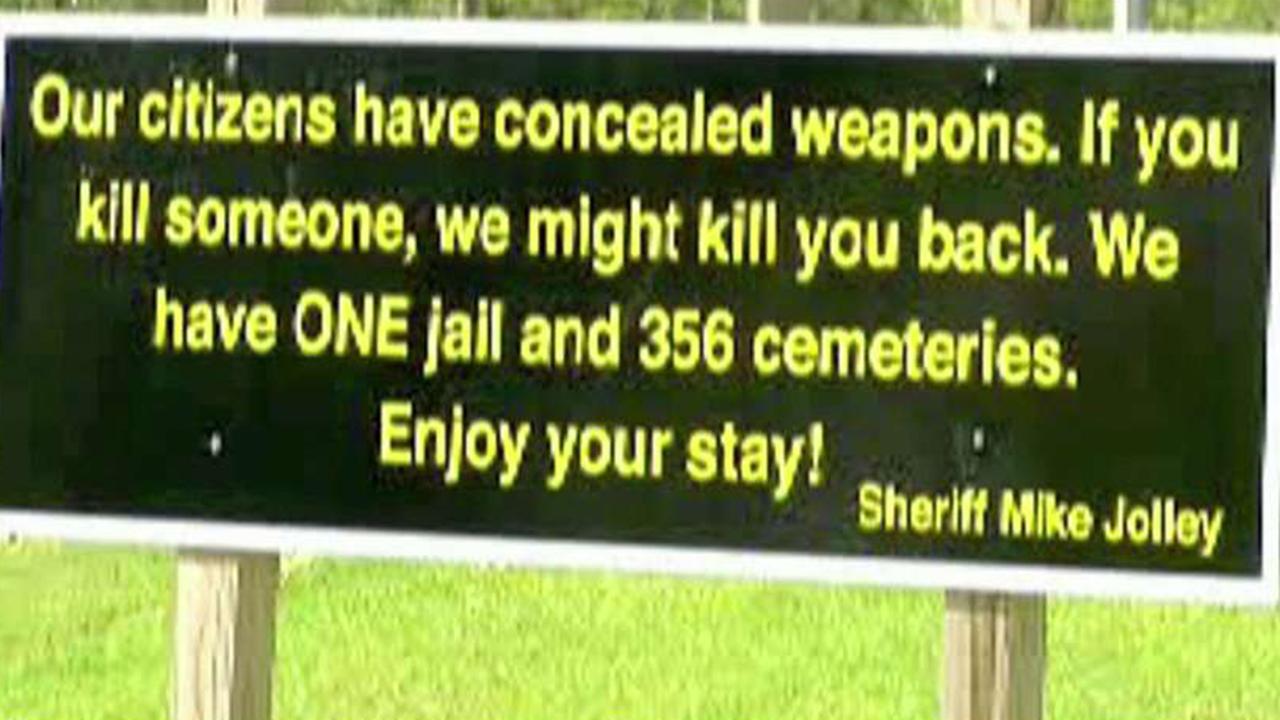 Georgia 'welcome' sign warns that locals are armed