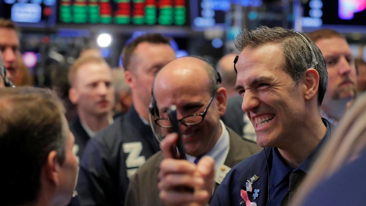 Markets overcome turmoil to finish week on a high note