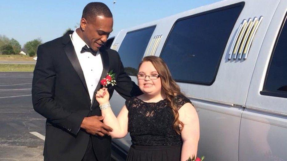 NFL star takes fan with Down syndrome to her high school prom