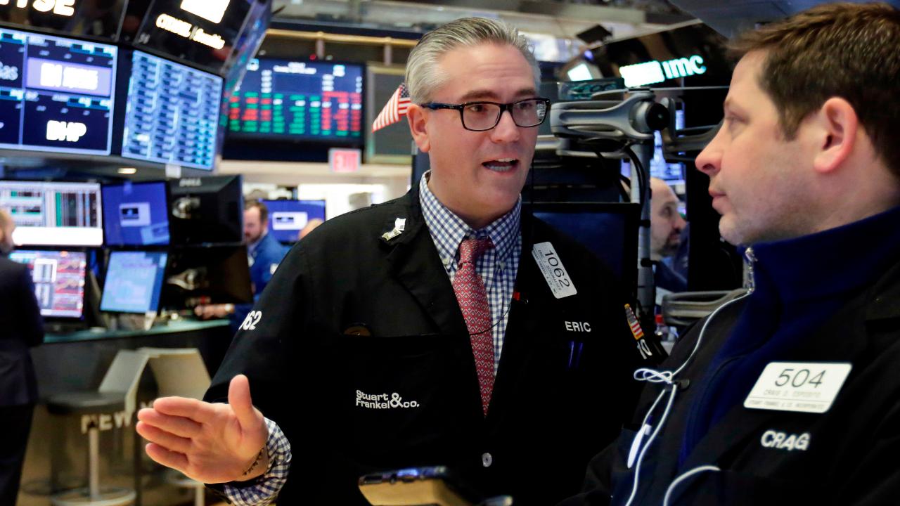 Stocks soar on optimism for strong earnings season