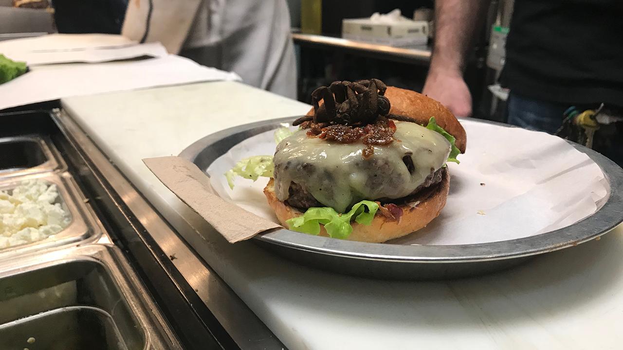 Customers go crazy over burgers topped with tarantulas