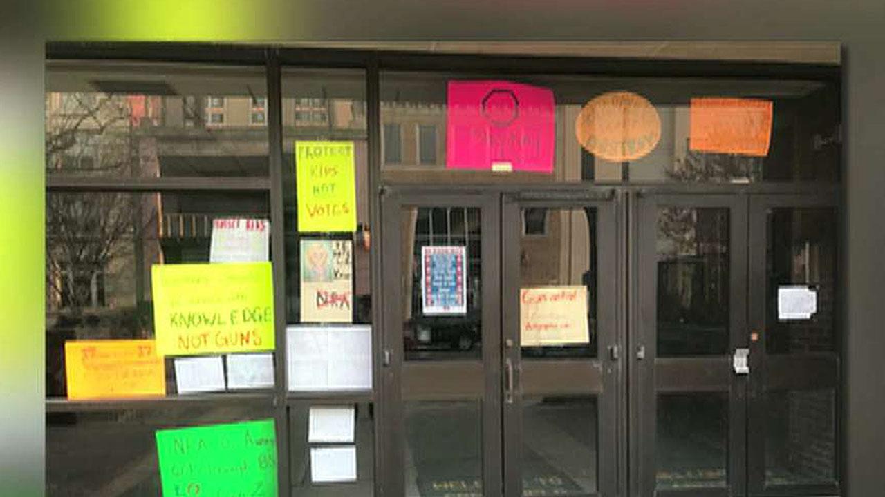 Anti-NRA and anti-GOP signs displayed at Philadelphia school