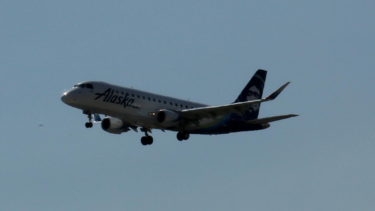 Woman dies on flight from Seattle to Kansas City