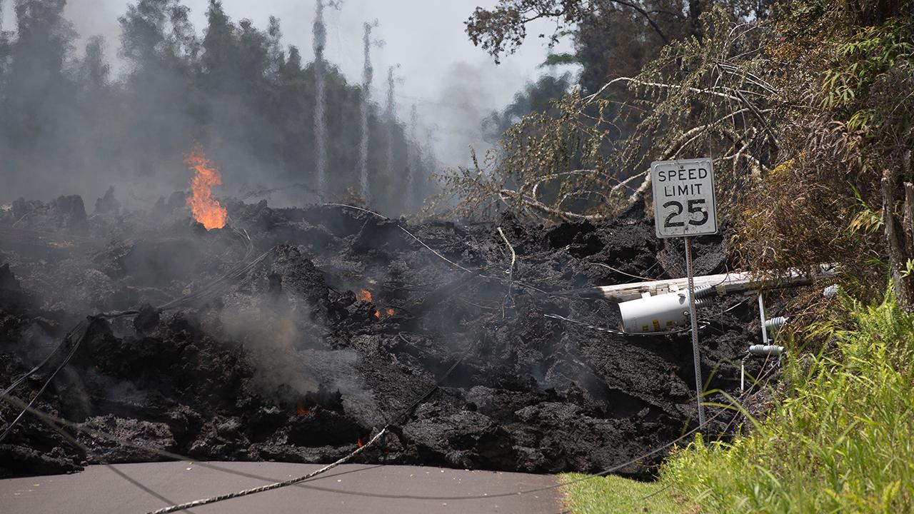 Hawaii volcano lays waste to dozens of homes