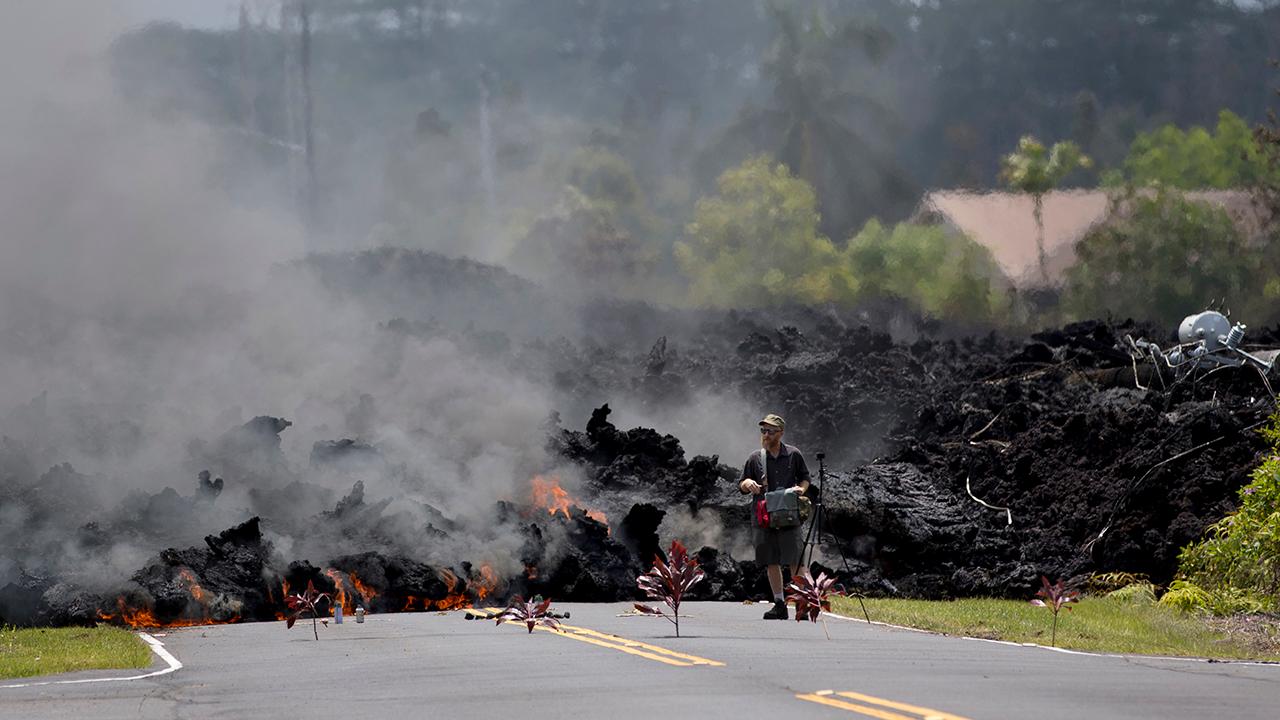Homes destroyed as Hawaii's Kilauea volcano erupts