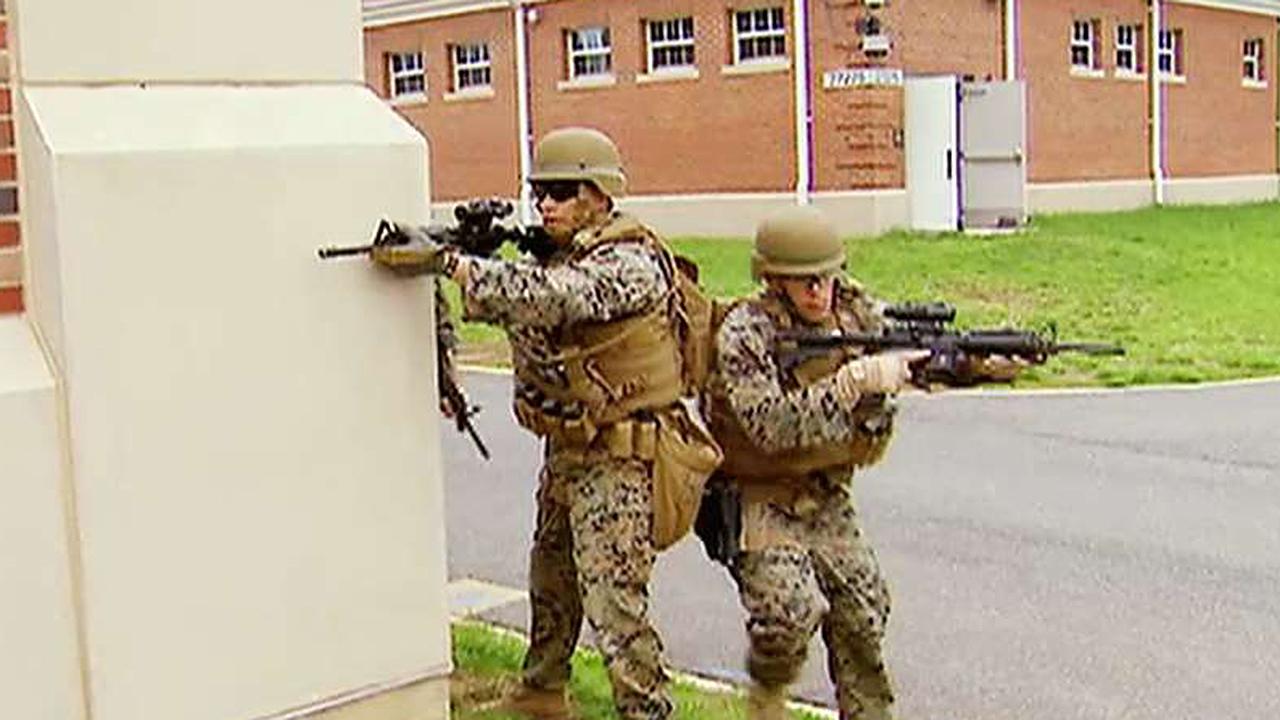 How are Marines trained to defend US embassies?