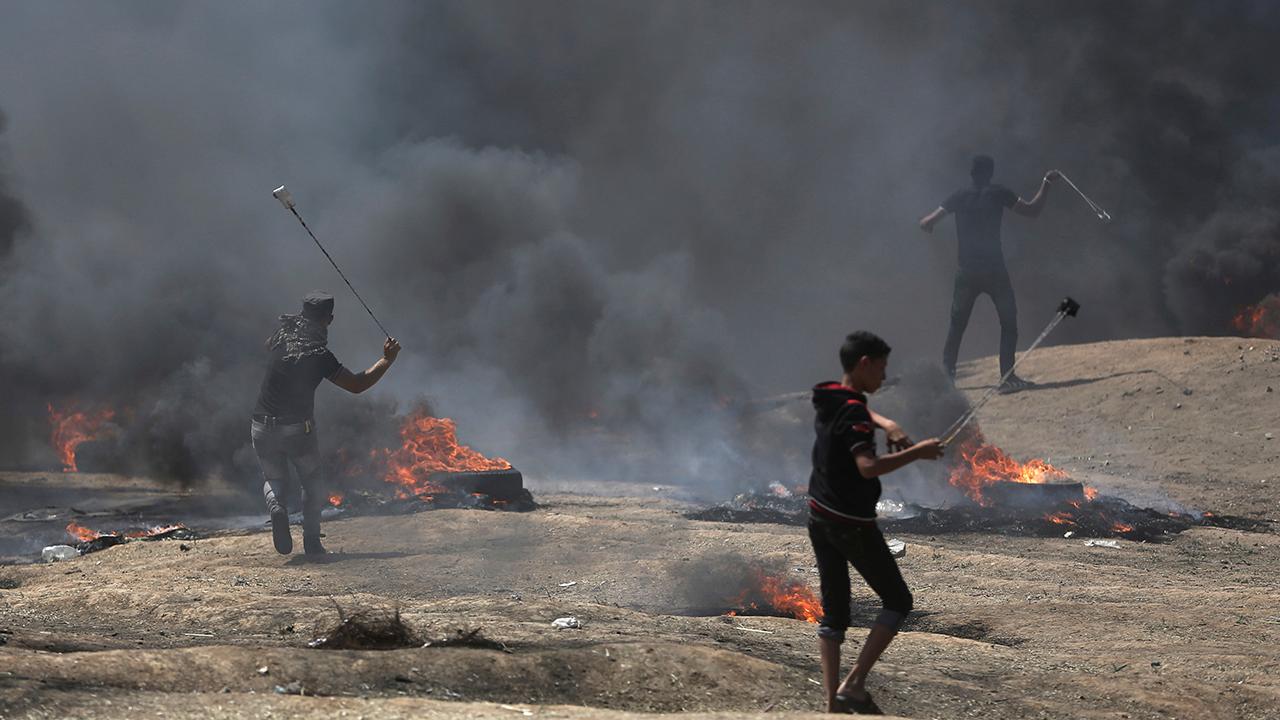 Dozens dead in clashes on Gaza border