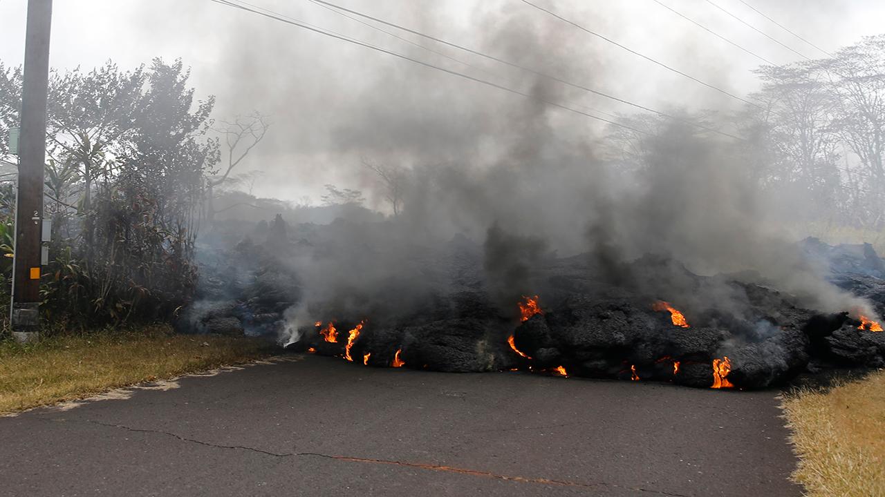 Hawaii officials rescue at least four people from lava flow