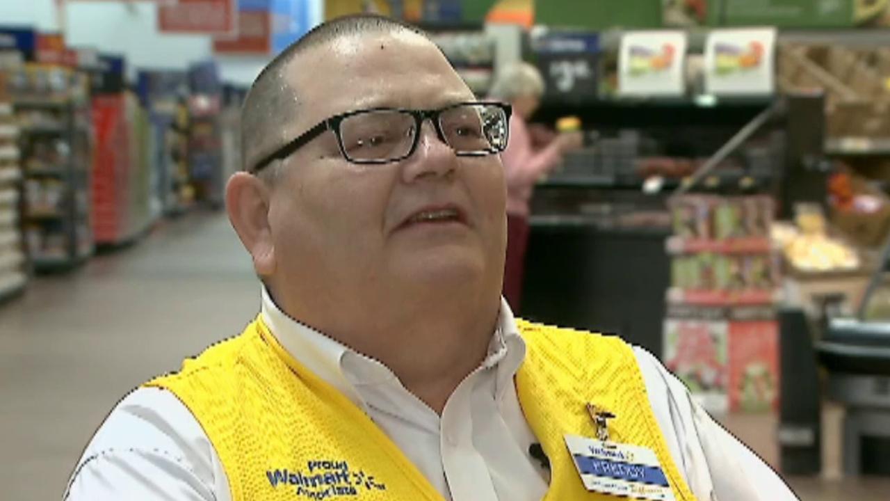 Ohio Walmart greeter honors local veterans by singing anthem