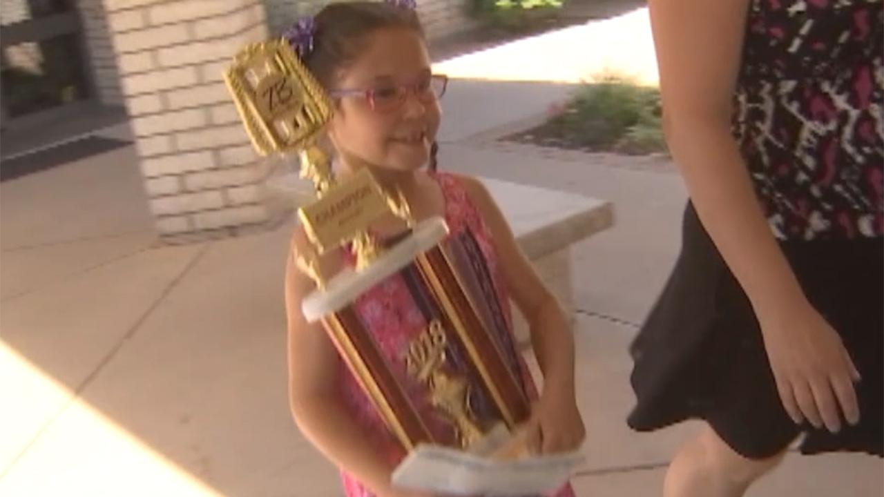 8-year-old with spina bifida wins national handwriting award