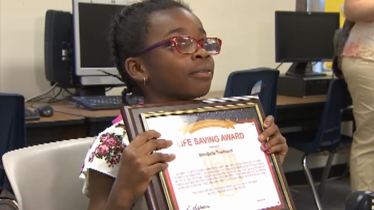 Quick-thinking 7-year-old saves family from fire