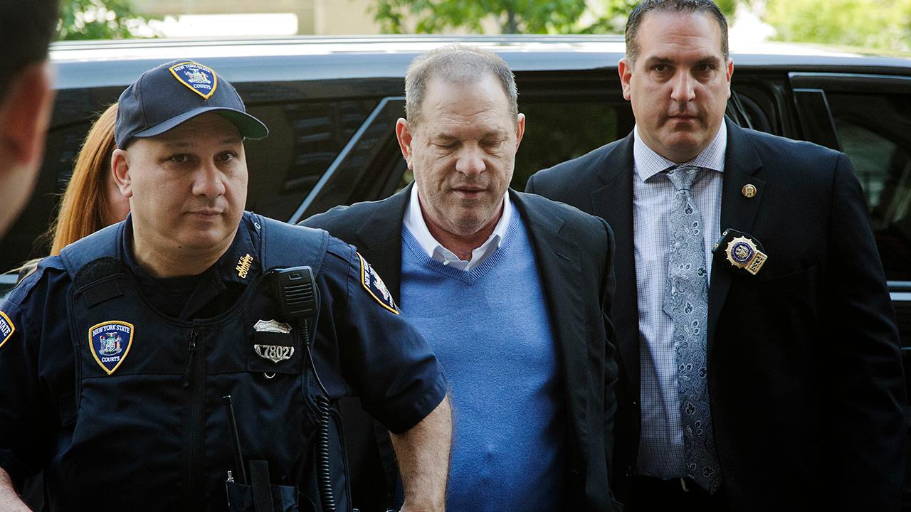 Harvey Weinstein walks into New York court in handcuffs