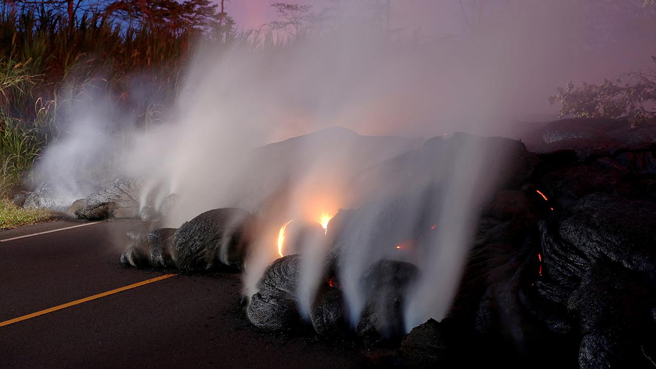 New lava flow covers crucial highway in Hawaii