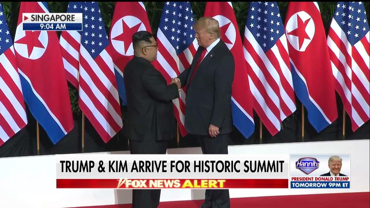 Trump, Kim Shake Hands