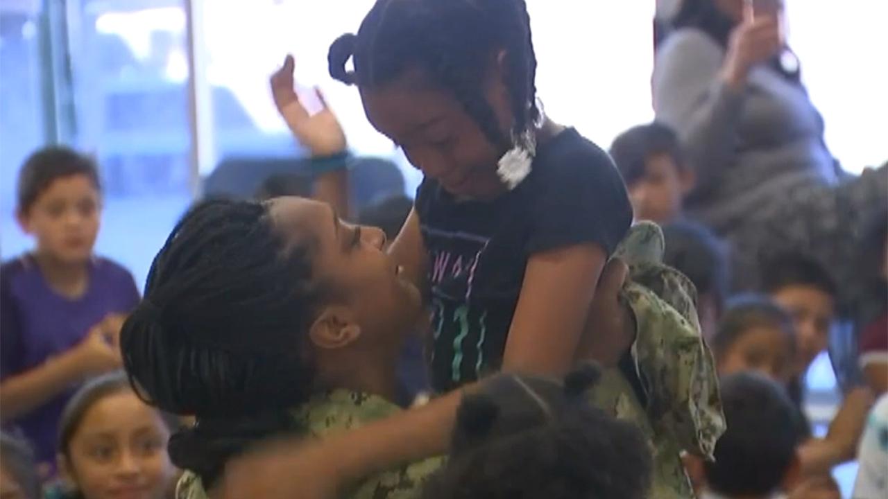 Navy mom surprises daughter at school in emotional reunion