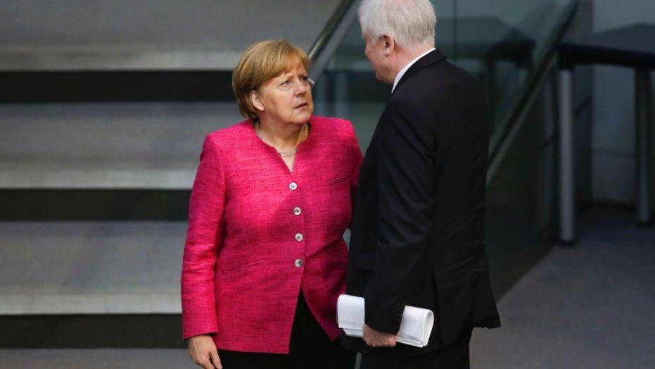 Angela Merkel at odds with coalition partners over migrants