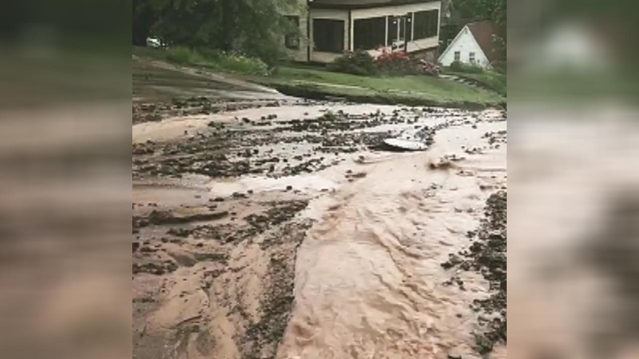 Flash flooding in Michigan rips apart roadways