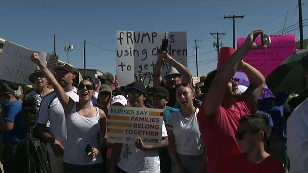 Protesters march to border migrant facility