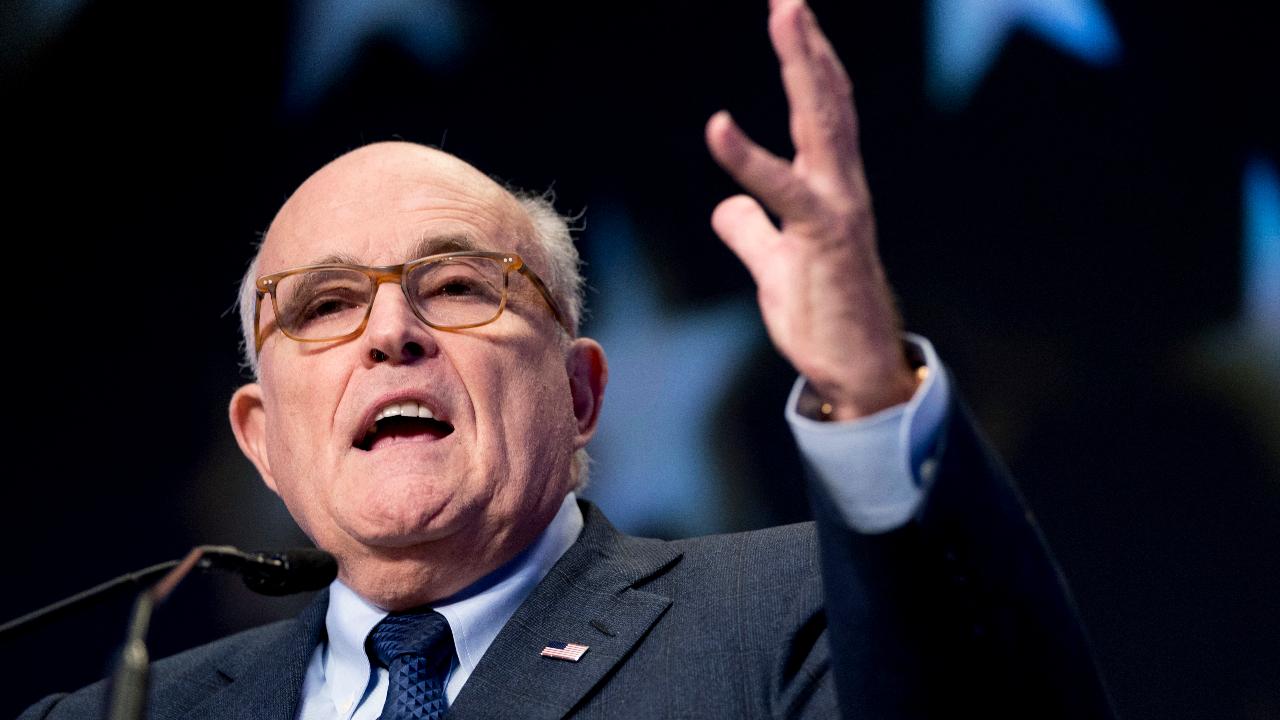 What did Giuliani know about the Clinton email probe?