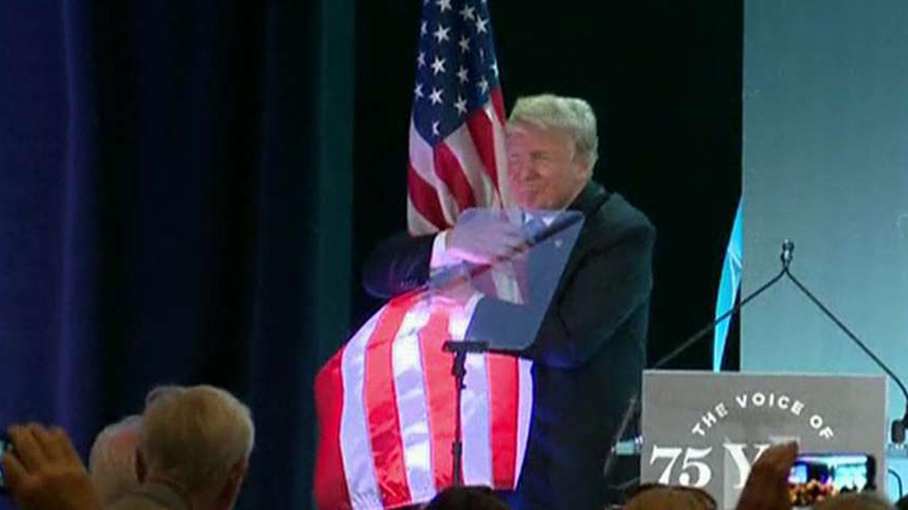 Video of Trump hugging American flag goes viral