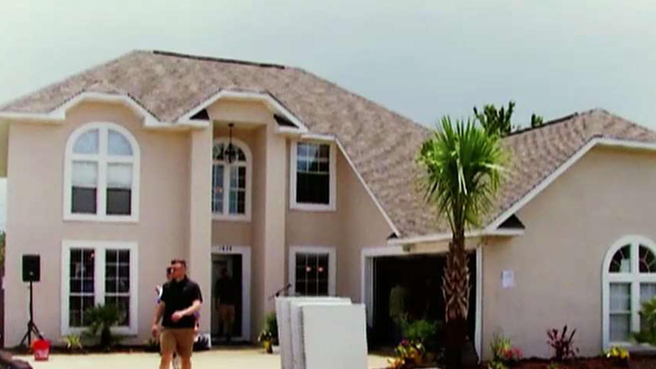 Building Homes for Heroes gifts house to Gold Star family