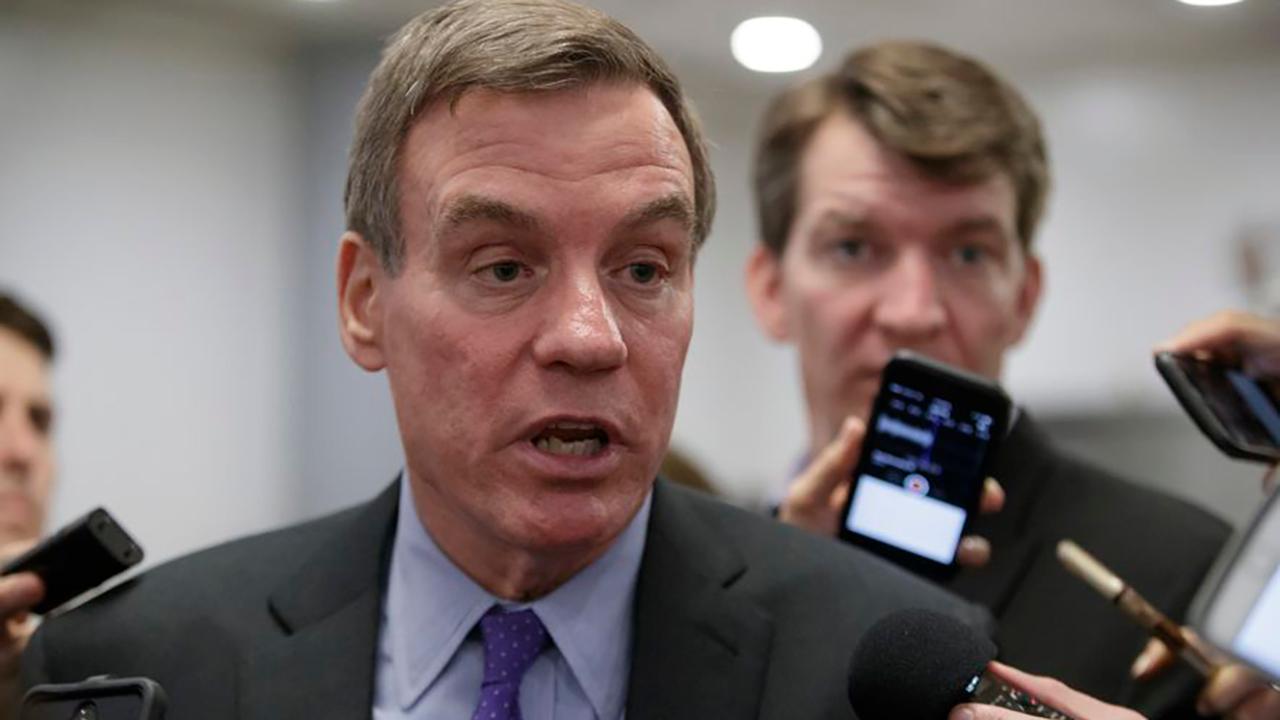 Report: Sen. Warner jokes about revealing Russia probe info