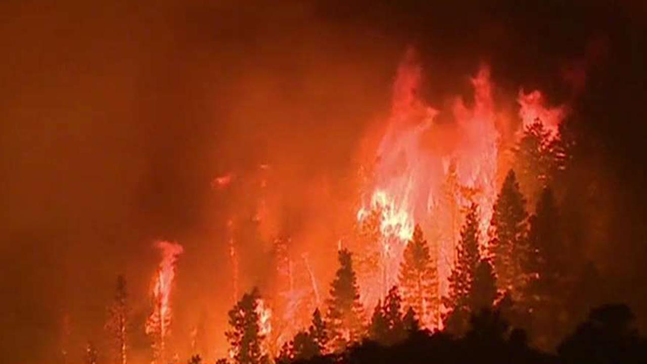Crews battle wildfires in Western states