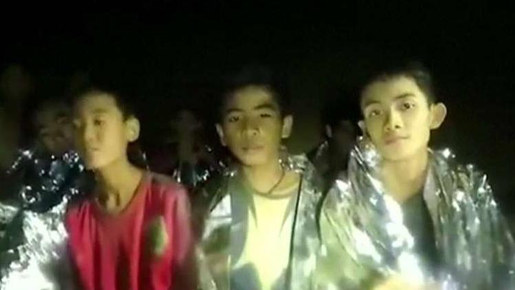 13 trapped in Thailand cave in stable condition