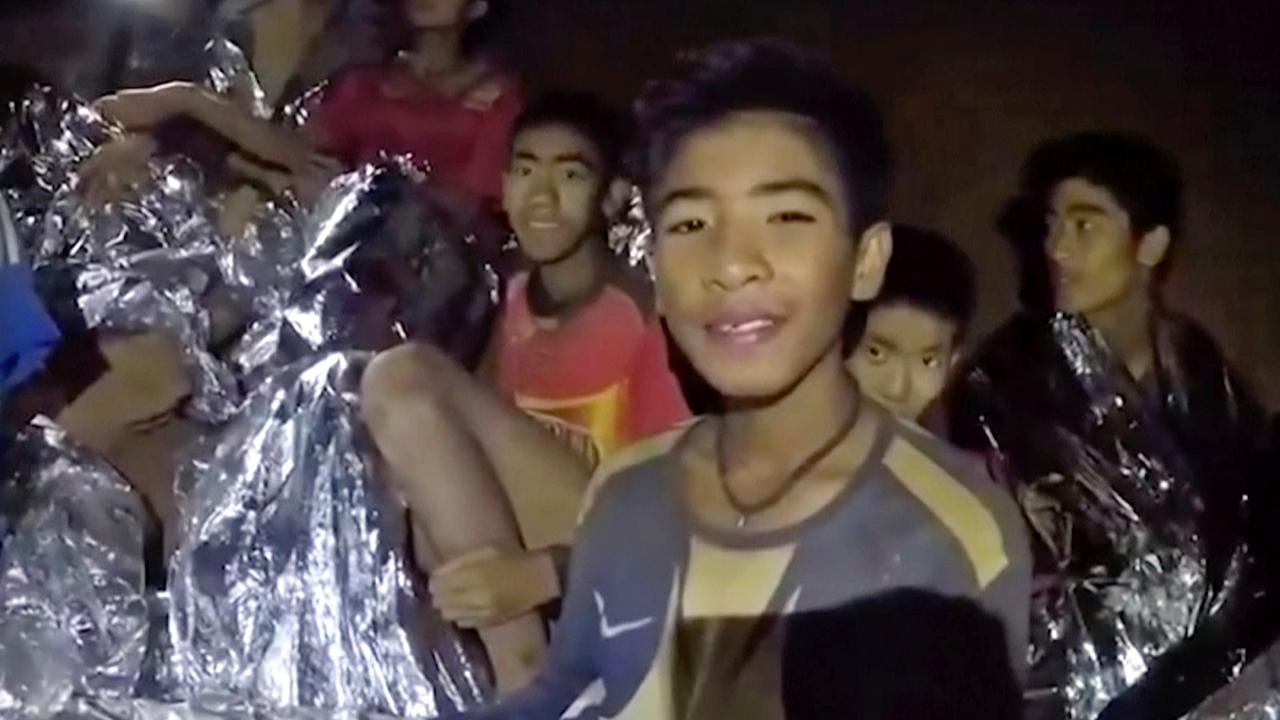 12 children, soccer coach trapped in cave in Thailand