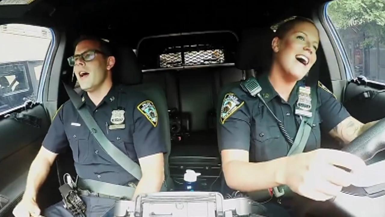 NYPD officers perform their own version of 'carpool karaoke'