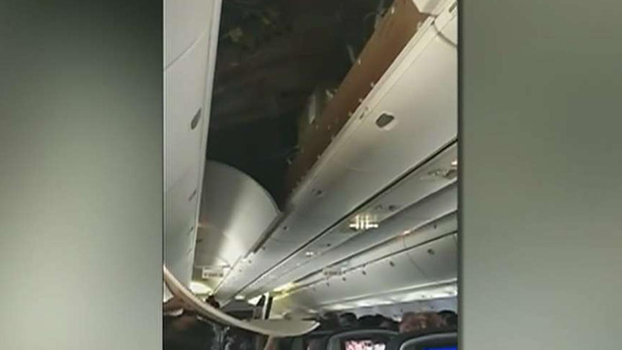 Airplane's ceiling panel falls during landing